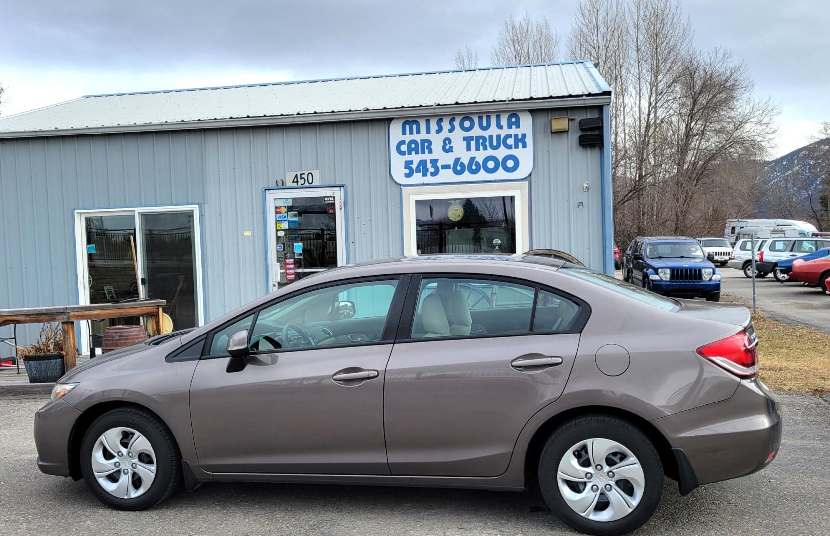 2013 Brown /Tan Honda Civic LX (2HGFB2F57DH) with an 1.8L I4 engine, 5 Speed Automatic transmission, located at 450 N Russell, Missoula, MT, 59801, (406) 543-6600, 46.874496, -114.017433 - Photo#0